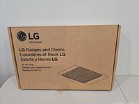 Sealed LG box front showing product name and illustration