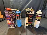 Mastercraft torch kit box, Bernzomatic torch kit box, blue and white propane cylinders, torch heads
