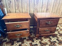 Front view of both nightstands showing drawers, hardware, finish