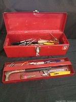 Open toolbox with removable tray and visible tools
