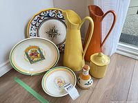 Group shot displaying all seven ceramic pieces