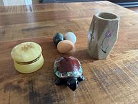 Group shot of all six carved stone items