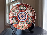 Front view showing full Imari design and size reference