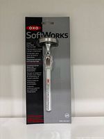 Front of sealed OXO SoftWorks instant-read meat thermometer package