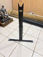 Full view of stand showing V-top and base