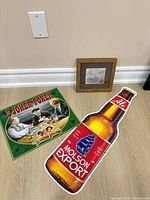 All three items grouped: Molson Export sign, Joker Poker poster, framed Beatles autographs