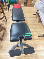 Top view showing padded seat and backrest with red Bowflex logo