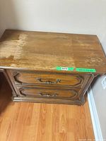 top view showing finish wear on nightstand surface