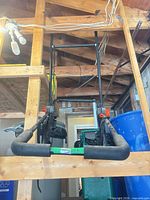 Front view of full bike rack showing frame and foam-padded arms