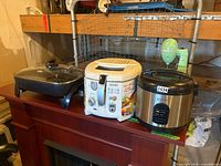 All three appliances displayed together on shelf