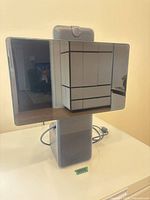 Meta Portal smart display on stand with power cable visible