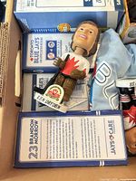 Box with Ken Dryden bobblehead and Blue Jays boxes visible
