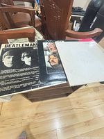 Overview of the three Beatles LPs on table