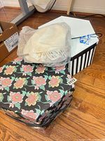 Floral hat box, white hat box, ivory hat in plastic cover