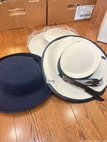 All three hats on floor