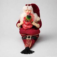Front view of plush Santa figure showing details and condition