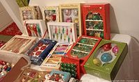Overall view showing all boxed sets and loose ornaments on table