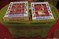 Tote with two boxed sets of ornaments visible