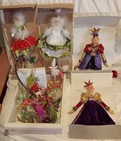 Group of assorted Krinkles figurines and ornaments in packaging and loose