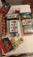 Overview of all boxed and loose ornaments on table
