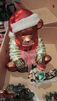 Glass teddy bear Santa figurine inside box