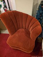 Front angled view showing overall form and upholstery