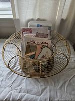 Basket filled with assorted cards and prints