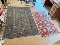 Both rugs laid out showing full patterns and colors