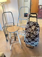 Group view of stool, ladder, wire cart, trolley