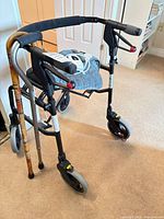 Walker with two canes attached, front and side view