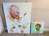 Front view of both canvas paintings showing designs and relative sizes