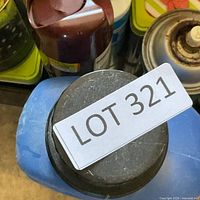 Overhead view of assorted cleaning supplies in containers
