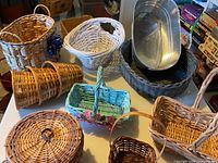 Group shot of all baskets and metal tub on table