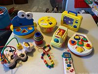 Overview of all nine toys on table
