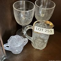 Group view: two goblets, one creamer, sugar bowl with lid