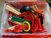 Open tote showing assorted track pieces