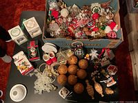overview of box and table full of Christmas decorations