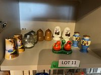 Shelf view of six salt and pepper shaker sets