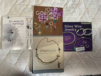 Front covers of all four jewelry craft books