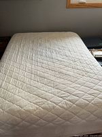 Top view of double mattress with quilted cover