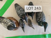 Group view showing all six bird figurines