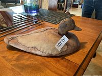 Profile view of duck decoy on table