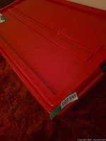 red lid of storage tote