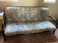 Full view of futon showing frame and mattress