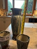 Carafe with tape measure indicating approx 11 in height, two tumblers in foreground