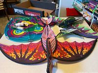 Three kites spread on table