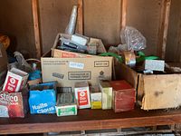 Shelf with multiple nail and screw boxes