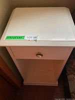 Front view showing full table, drawer, open shelf