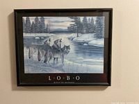 Framed LOBO "Right of Passage" wolves print on wall