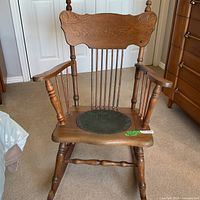 full view of wooden rocking chair showing overall design